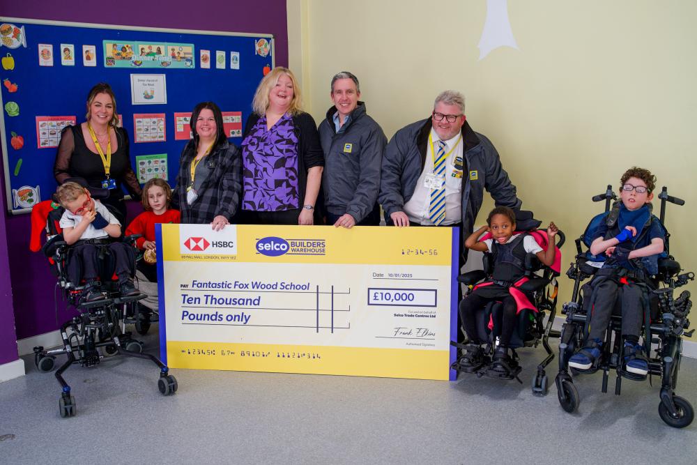 Selco Marketing Director David Lennon presents cheque to Fox Wood School