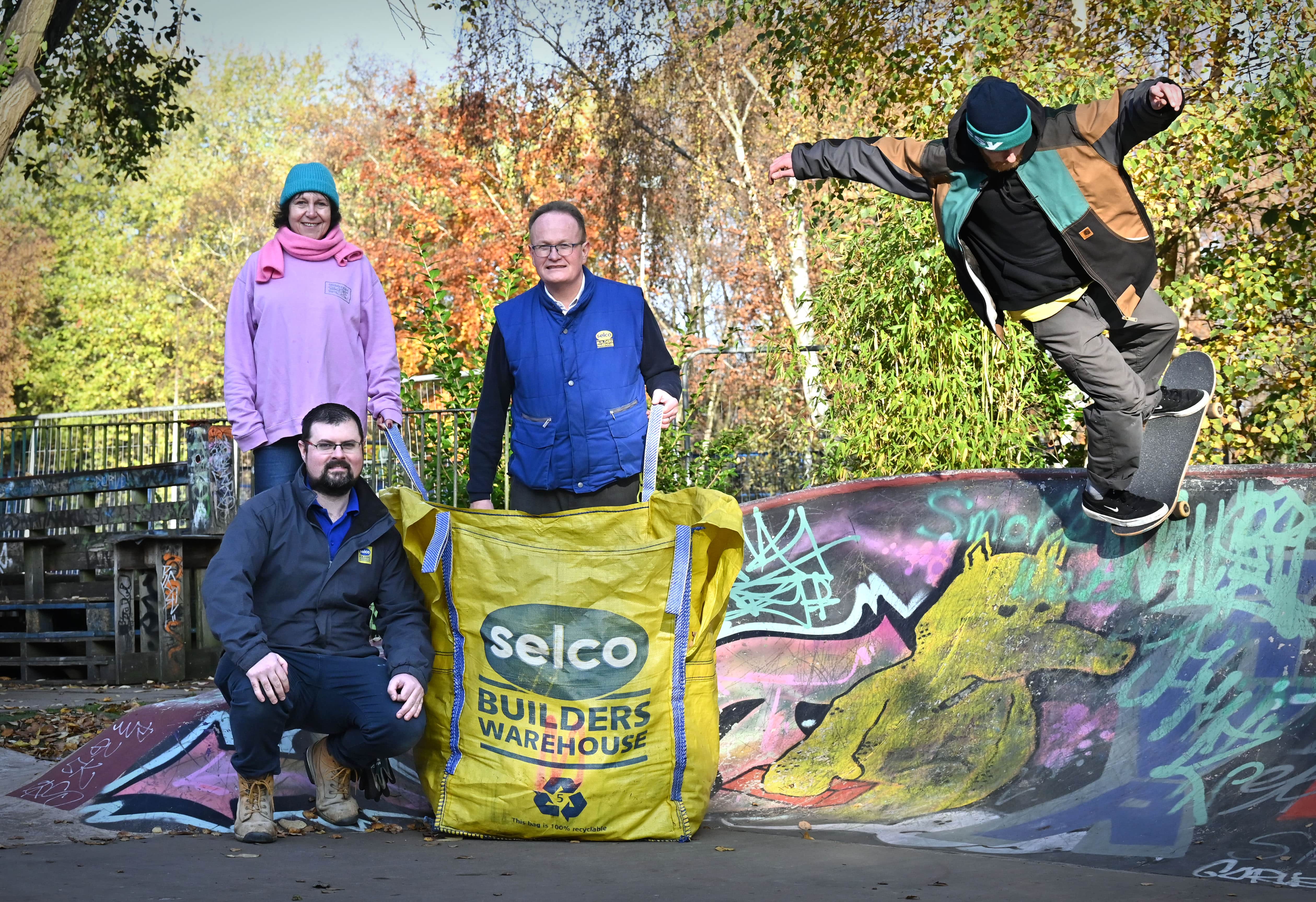 Selco employees help at a skate park