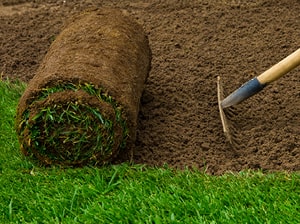 garden turf rolls and rake